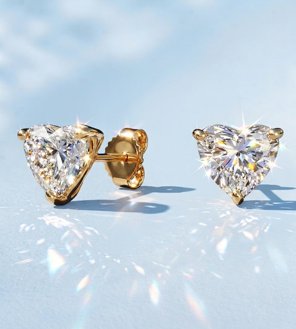 Heart-shaped lab-grown diamond stud earrings in yellow gold
