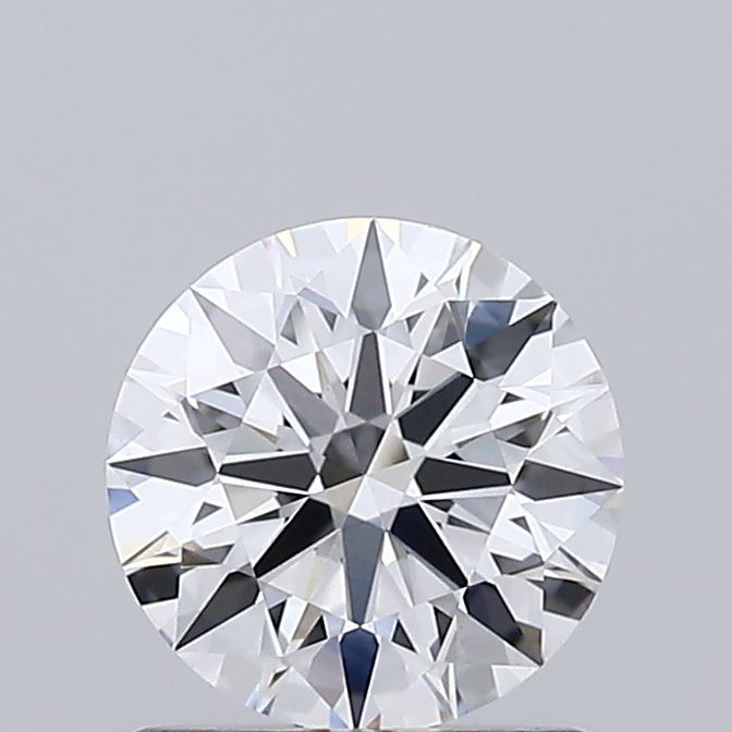 0.99 A close up of a round brilliant cut diamond against a grey background.