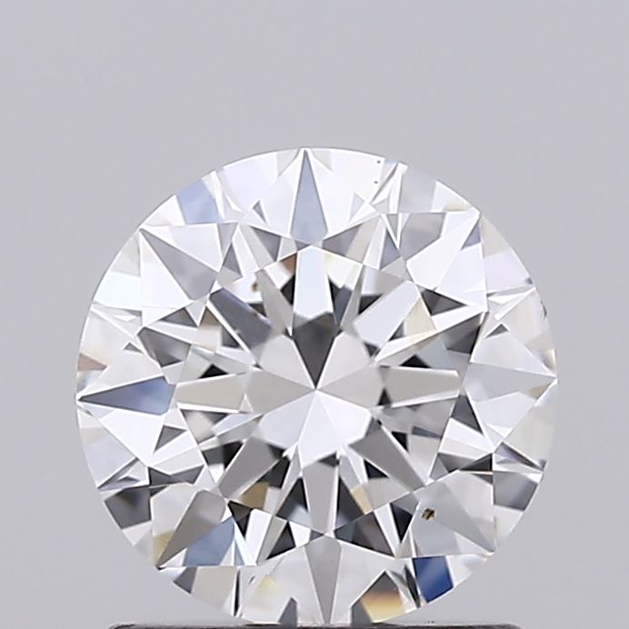 1.01 A sparkling round-cut diamond against a plain gray background, showcasing brilliant facets and a symmetrical pattern, exuding elegance and luxury.