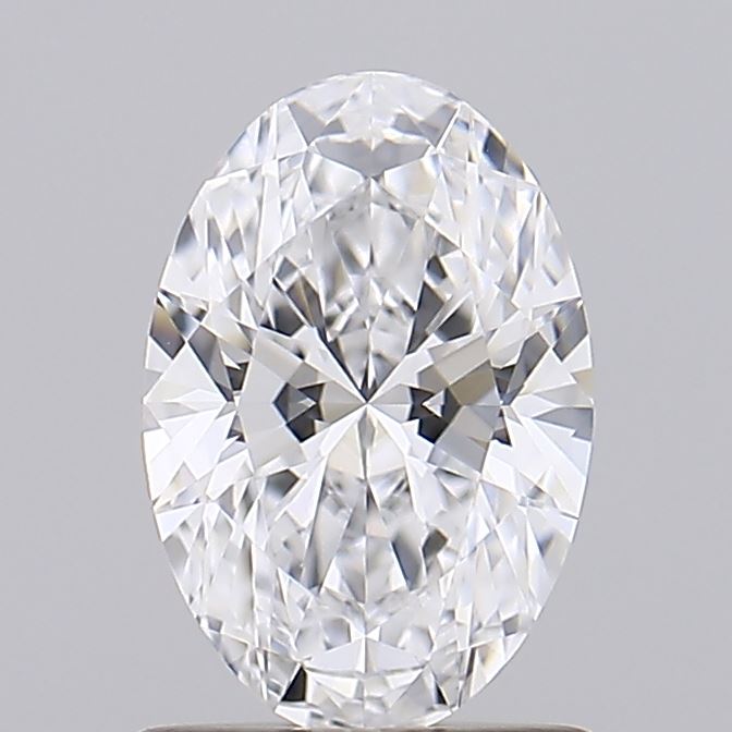 1.02 An elegant oval-cut diamond, showcasing brilliant facets that reflect light against a soft gray background.