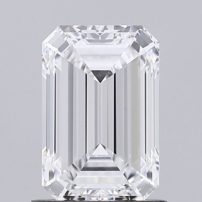 Emerald cut clear diamond against a grey background.