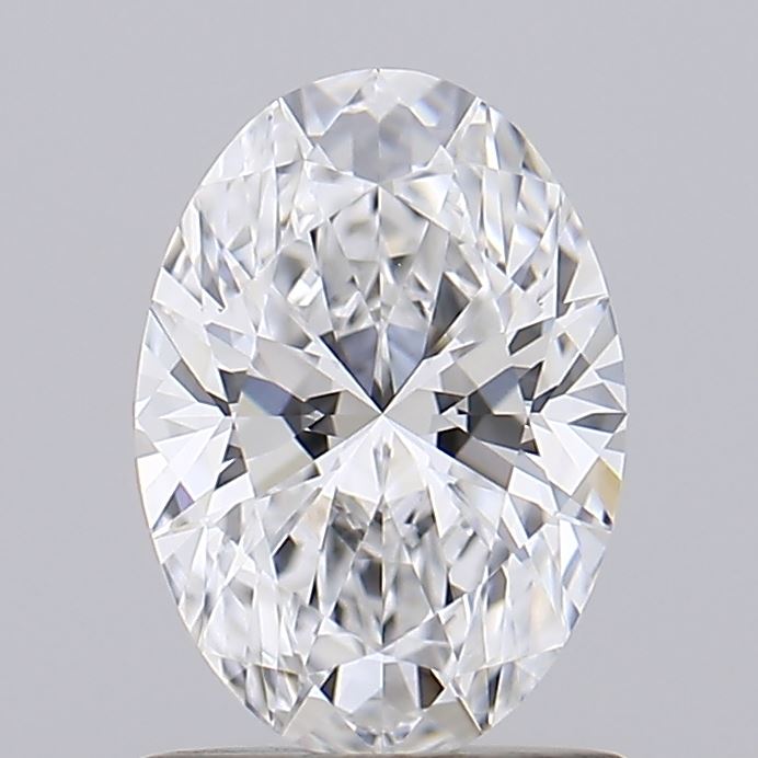 1.04 An exquisite, oval-cut diamond sparkling with brilliance and intricate facets against a soft gray background.