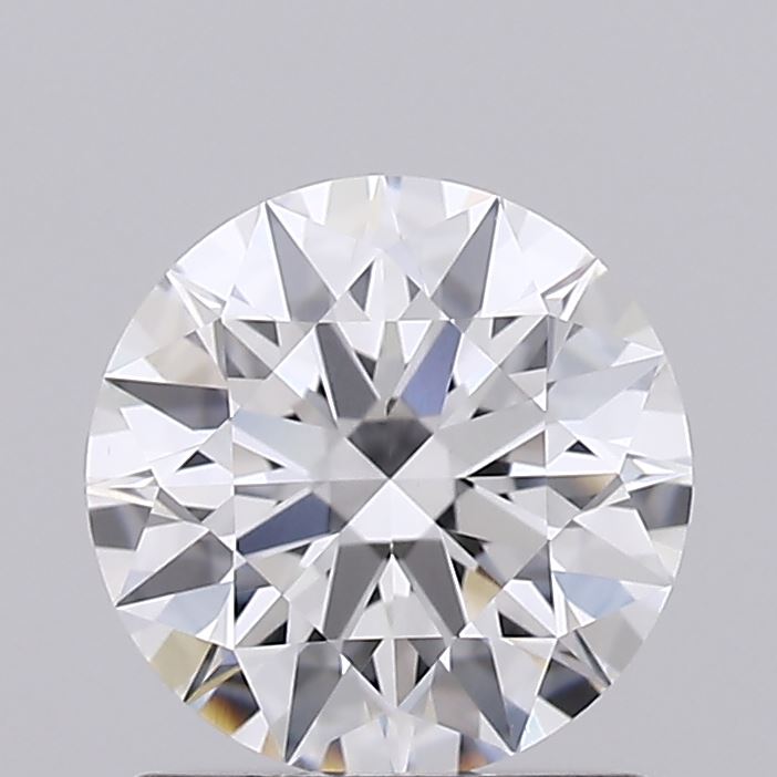 1.06 Close-up of a round, brilliant-cut diamond against a gray background. The facets shimmer, displaying a symmetrical pattern with a clear, sparkling appearance.