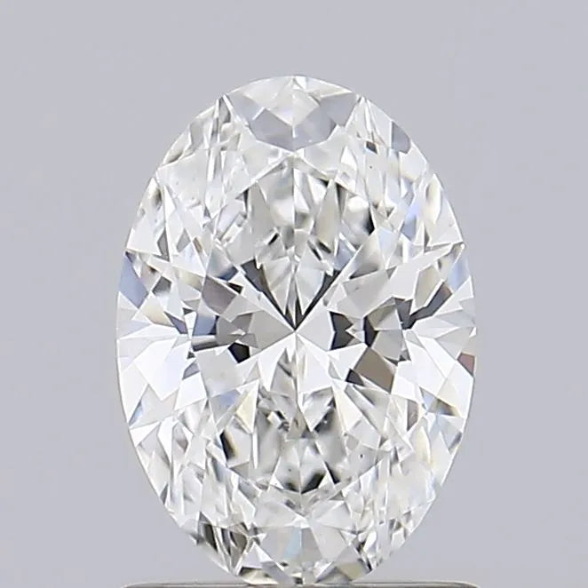 1.06 An oval cut diamond showcased against a grey background.