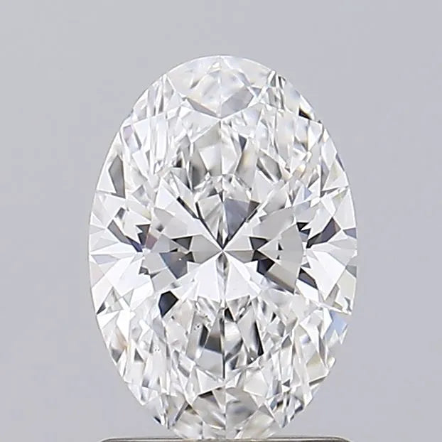 1.08 Oval cut diamond with multiple facets and brilliant sparkle on a grey background.