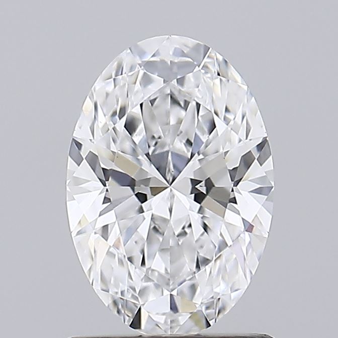 1.09 Close-up of a sparkling oval diamond, showcasing intricate facets that reflect light brilliantly against a soft gray background.