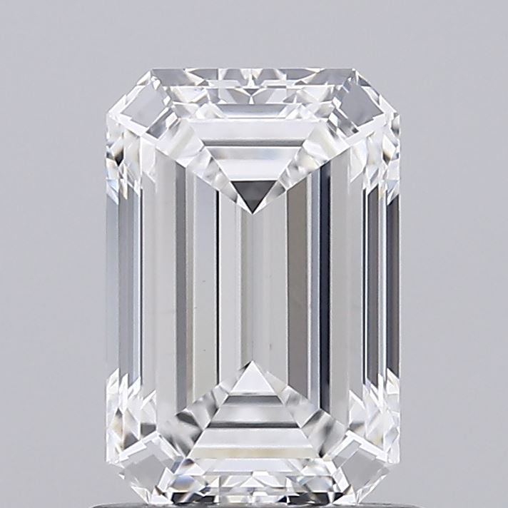 1.09 An emerald-cut diamond with sharp, clean edges and reflective facets against a gray background, showcasing clarity and elegance.