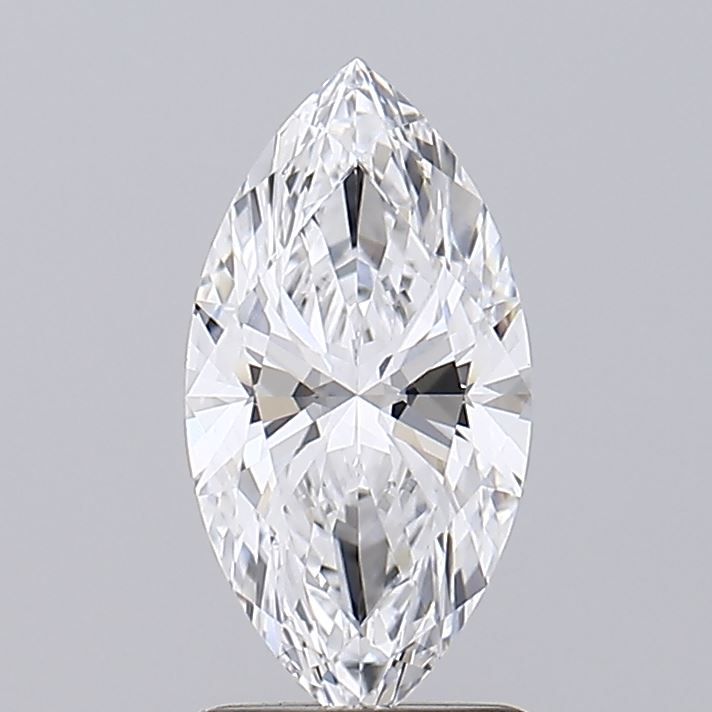 1.33 A close up of a marquise cut diamond against a grey background.