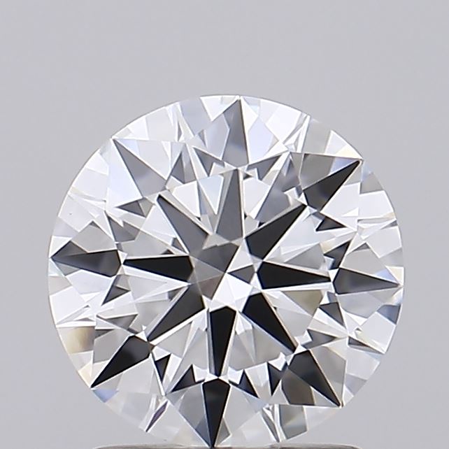1.5 Close-up of a brilliant round diamond showcasing its sparkling facets and clarity against a neutral gray background.