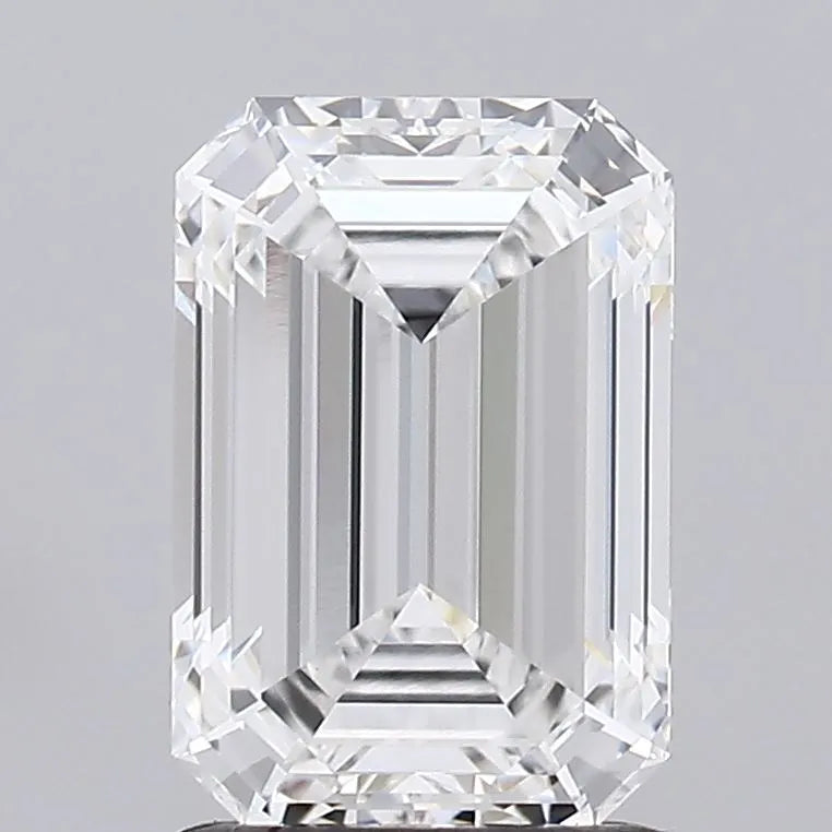 1.54 A sparkling emerald cut diamond against a gray background.