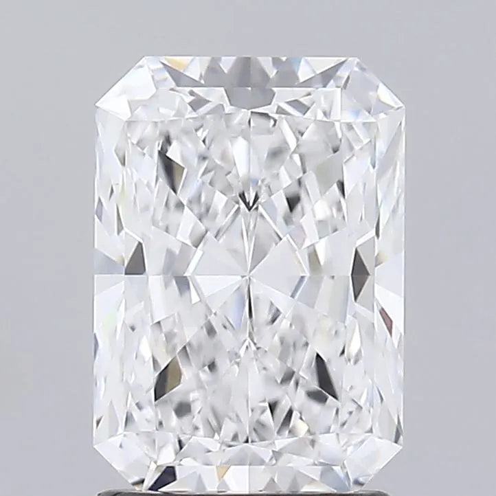 1.58 A radiant cut diamond with multiple facets reflecting light on a gray background.