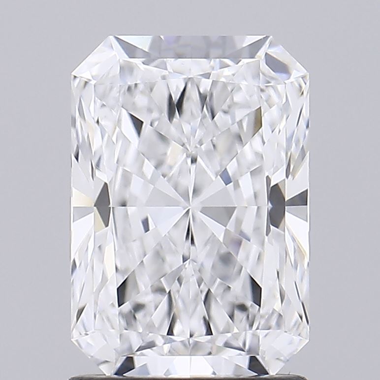 1.59 Brilliant rectangular diamond with clear facets, reflecting light beautifully against a neutral gray background.