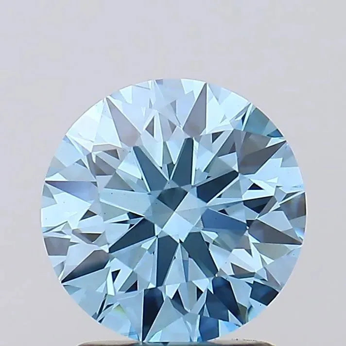 1.7 A dazzling round light blue diamond expertly cut to showcase its brilliance resting on a neutral background.