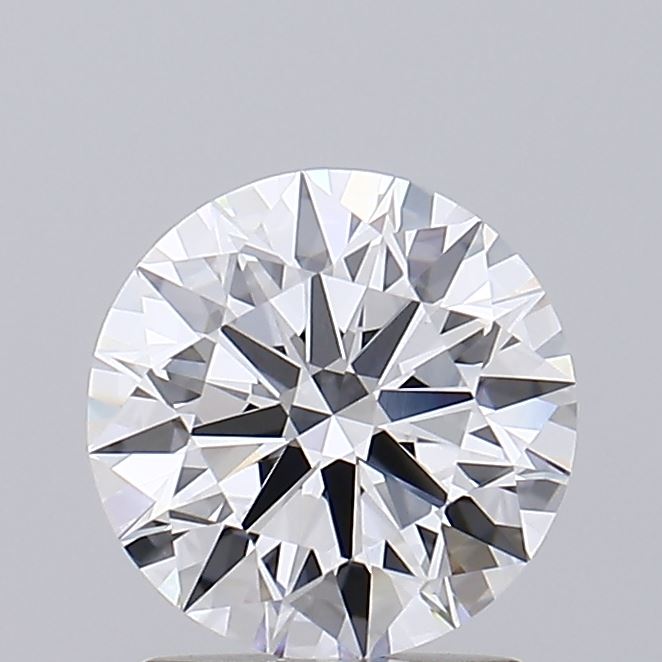 1.7 A close-up of a round, brilliant-cut diamond against a grey background.