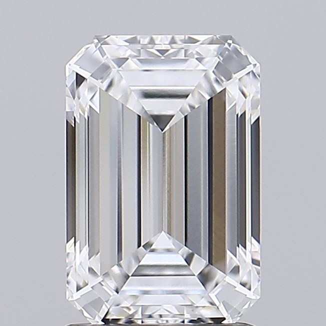 1.71 A close-up view of a sparkling, clear emerald-cut diamond, showcasing its elegant facets and reflective brilliance against a gray background.