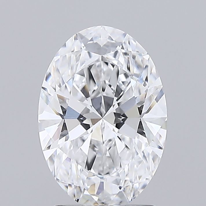 1.71 Oval-shaped diamond with a brilliant cut on a gray background, showcasing intricate facets that reflect light, creating a captivating sparkle.