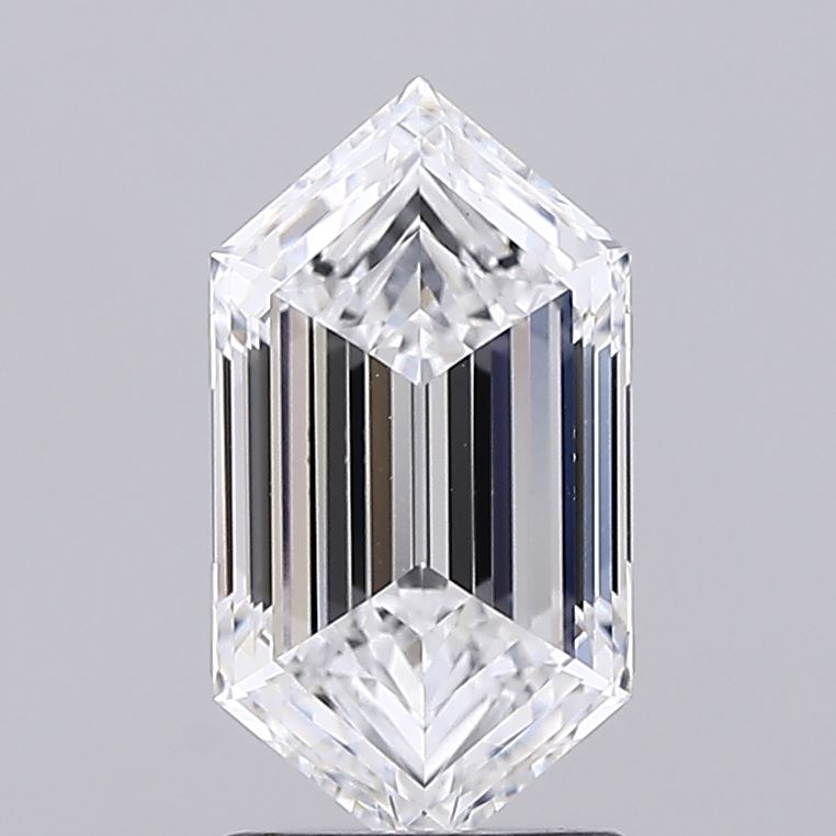 1.73 A hexagonal-shaped diamond with intricate faceting reflects light brilliantly. It's set against a plain gray background, exuding elegance and luxury.
