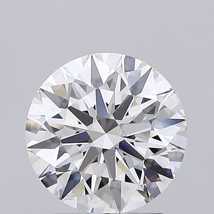 1.77 A brilliant round cut diamond with multiple facets against a grey background.