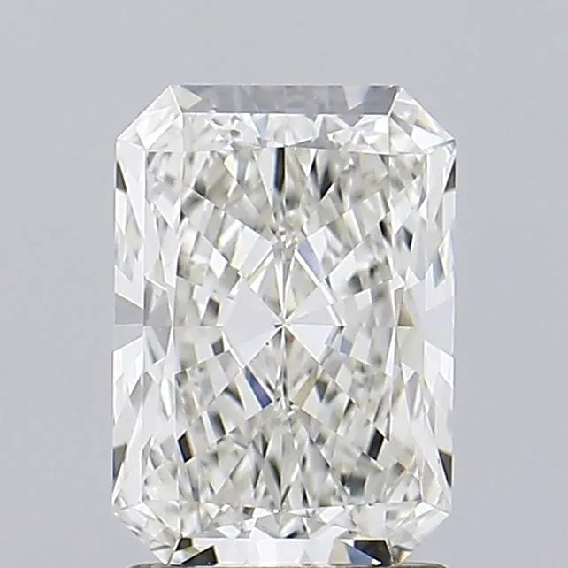 1.81 A close up of a radiant cut diamond against a grey background.