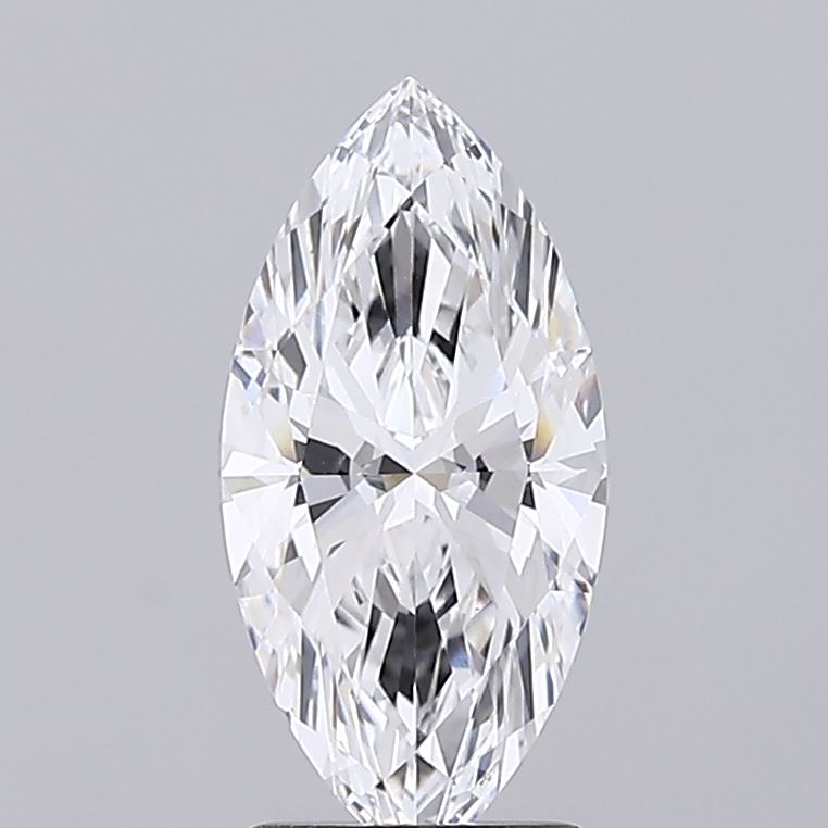 1.86 A close up of a marquise cut diamond sparkling against a grey background.