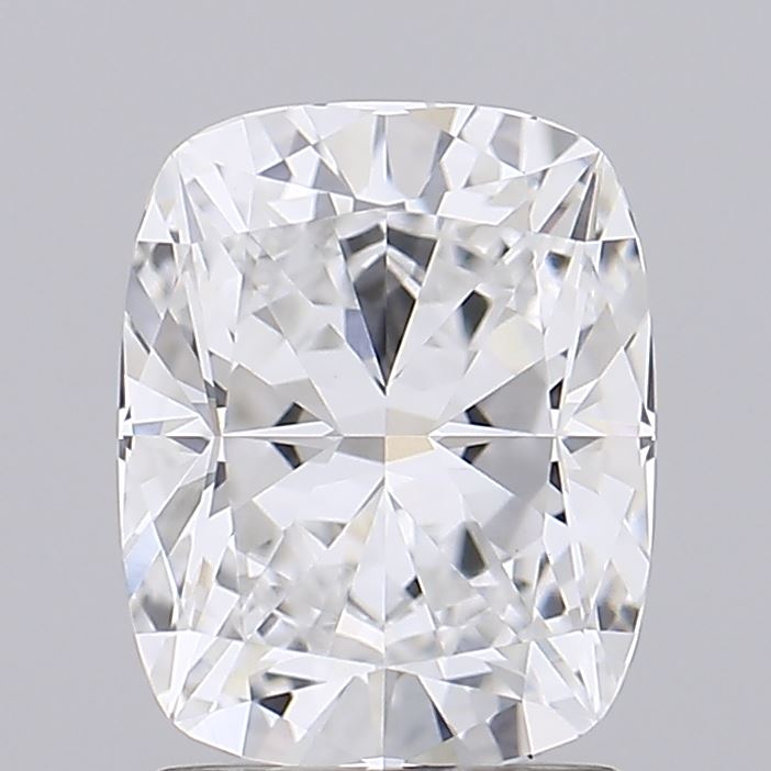 1.92 Cushion-cut diamond with brilliant facets, reflecting light on a gray background. The gem's clarity and sparkle convey elegance and luxury.