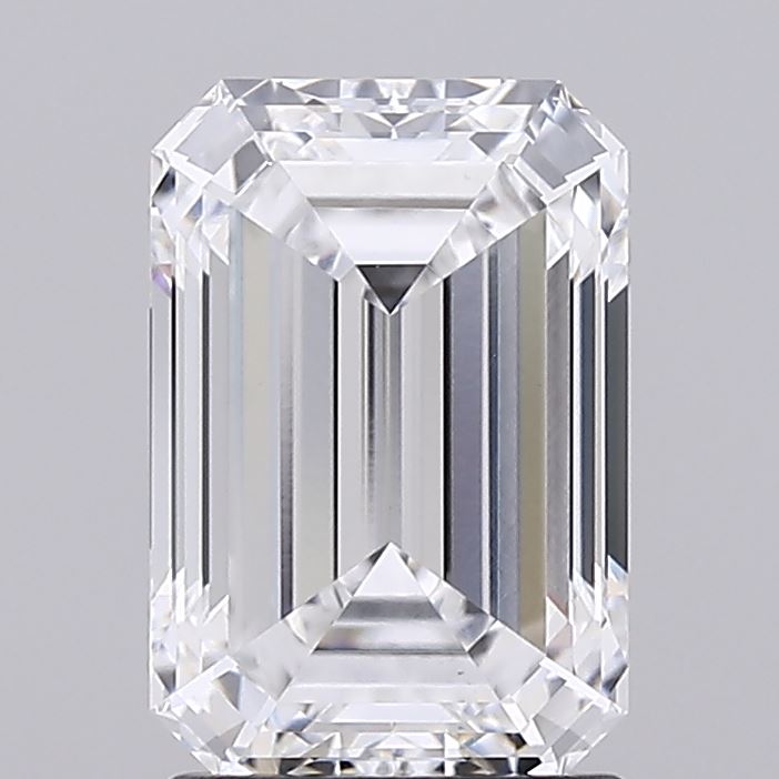 1.95 Emerald-cut diamond on a gray background, displaying clear facets and sharp edges. The gem's symmetry and brilliance convey elegance and purity.