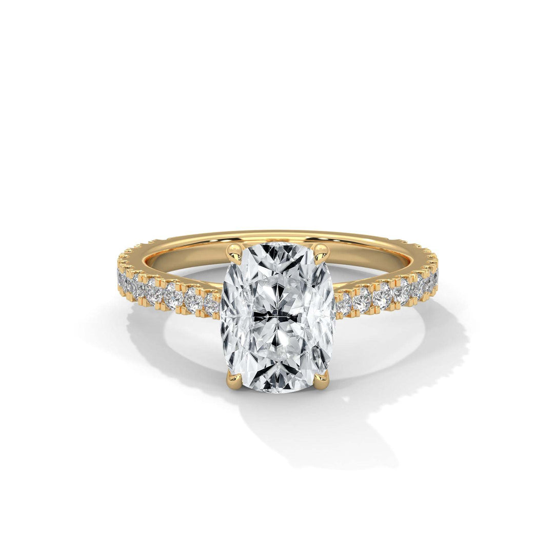 Étoile Tulip Setting engagement ring with a cushion-cut center diamond and pavé diamond band in yellow gold