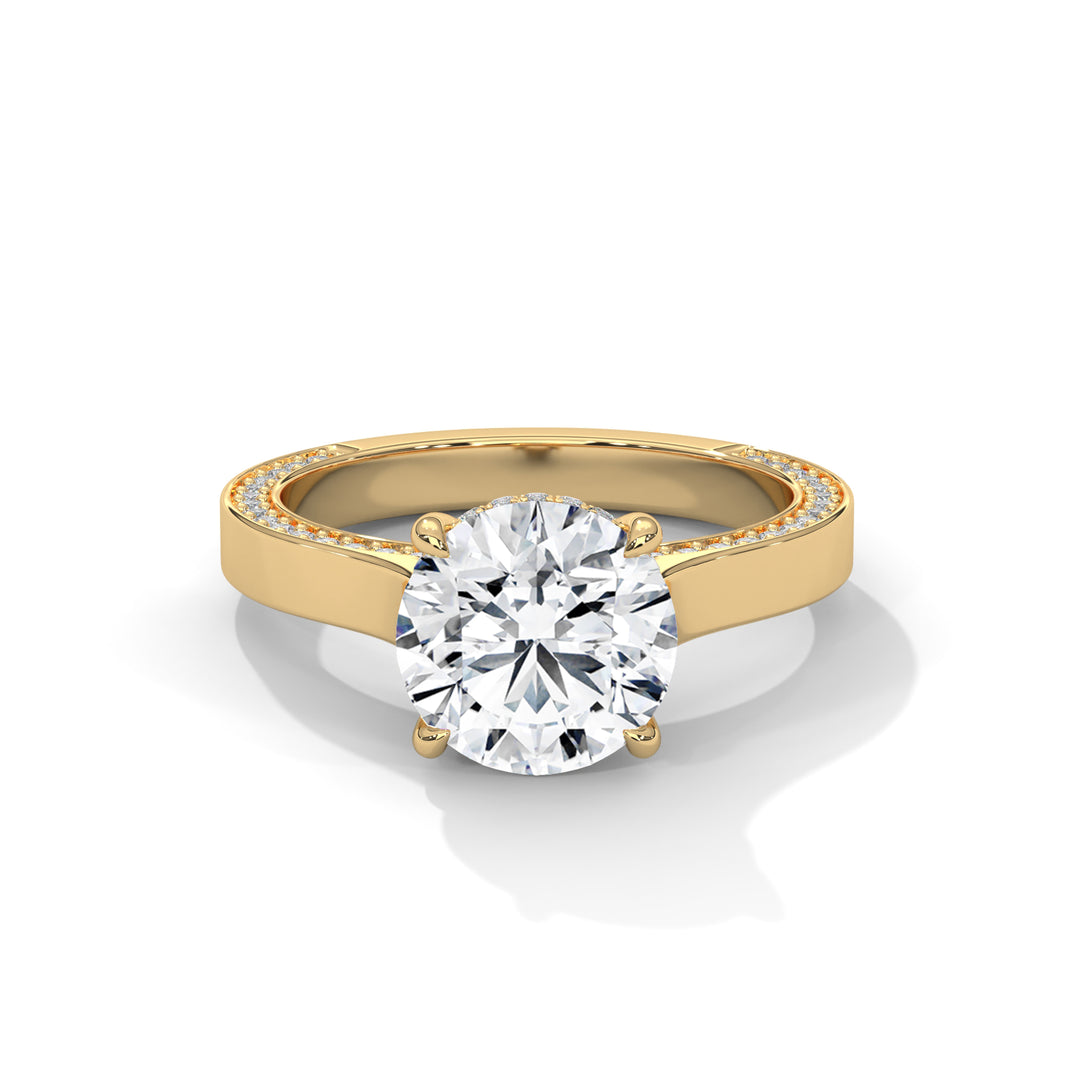 Gold ring with a large diamond on a white background