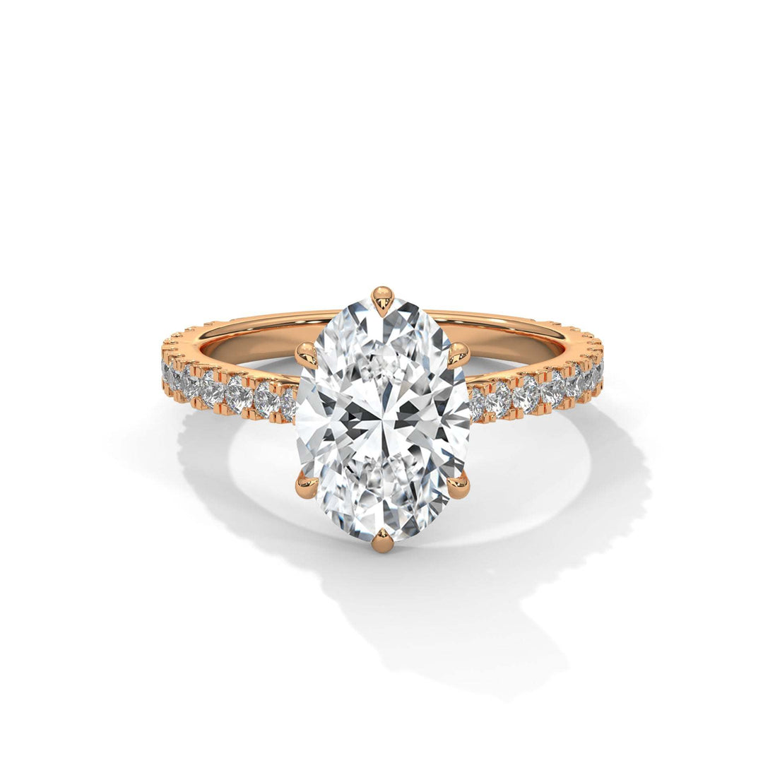 Étoile Tulip Setting rose gold engagement ring with oval center diamond and pavé diamond band