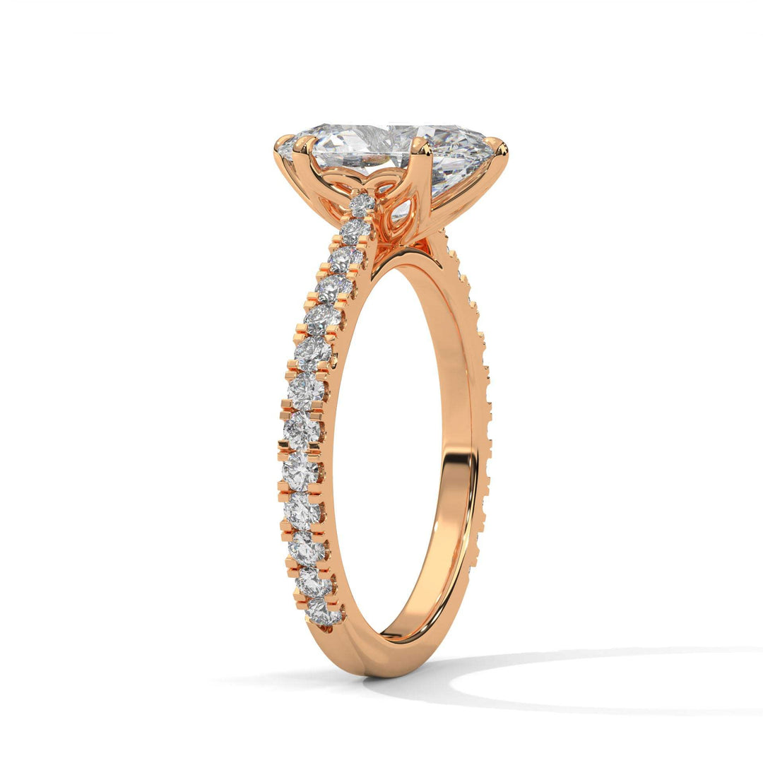 Rose gold engagement ring with pavé-set diamonds and a tulip-inspired setting showcasing a large central diamond Étoile Tulip Setting