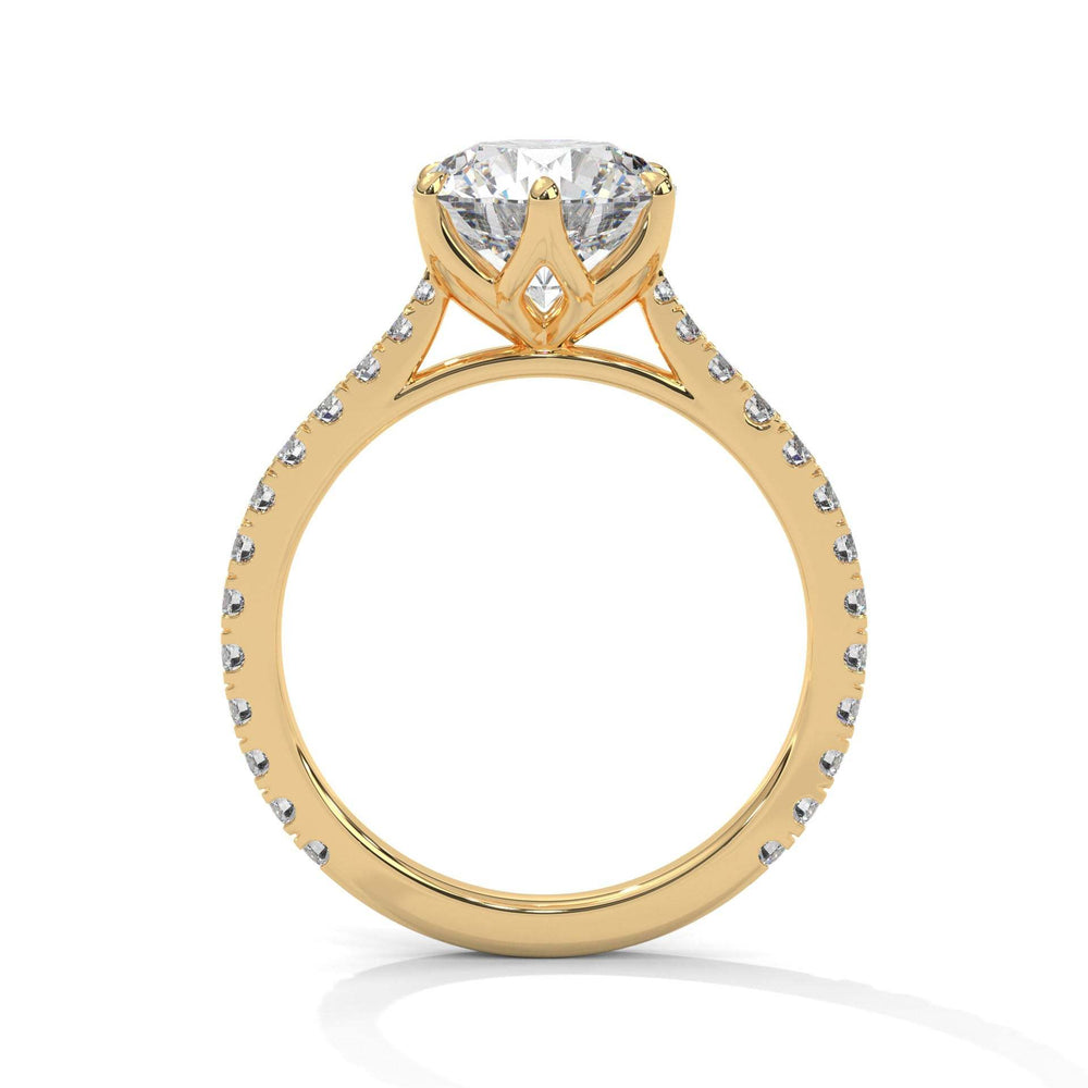 Étoile Tulip Setting gold engagement ring with pavé diamonds and tulip-inspired gallery holding a center diamond