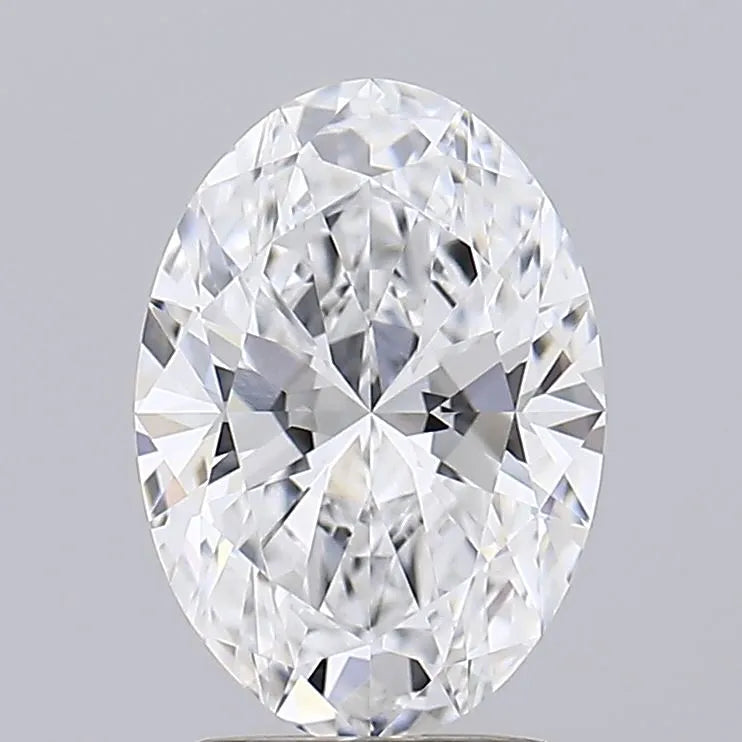 2.01 An oval cut diamond with multifaceted surfaces on a neutral background.