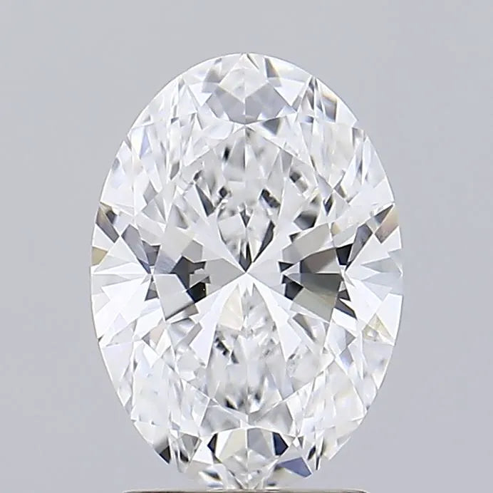 2.02 A sparkling oval cut diamond with multiple facets against a gray background.