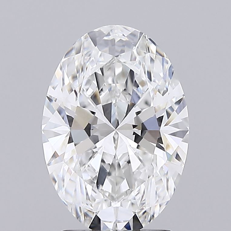 2.02 Oval-shaped diamond with intricate facets reflecting light, creating a dazzling, multi-colored sparkle against a plain gray background.