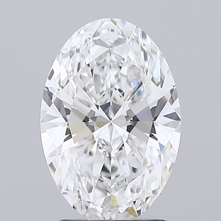 2.03 A brilliant, oval-cut diamond sparkles with numerous facets, reflecting light against a smooth gray background.