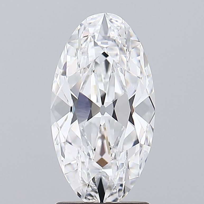 2.03 Oval diamond cut in half, displayed on a sleek black stand, highlighting its intricate facets and brilliance.