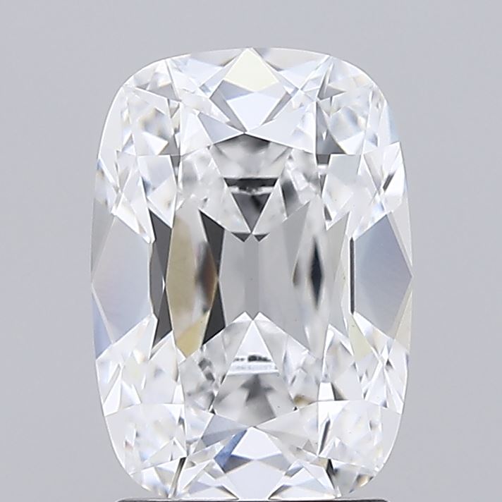 2.03 A sparkling, cushion-cut diamond with a brilliant shine, displaying symmetrical facets. Set against a plain gray background, the diamond exudes elegance.