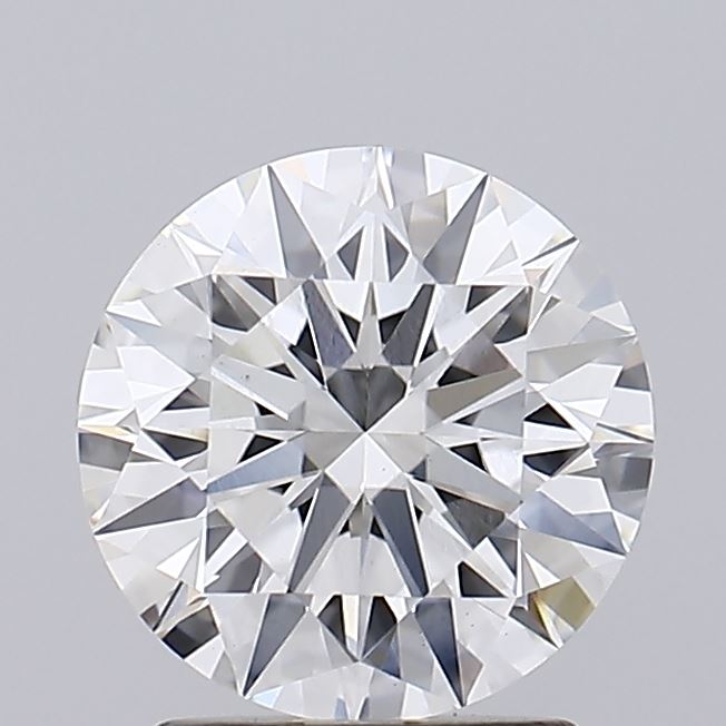 2.05 Close-up of a brilliant-cut round diamond, showcasing its sparkling facets and clarity against a soft gray background.