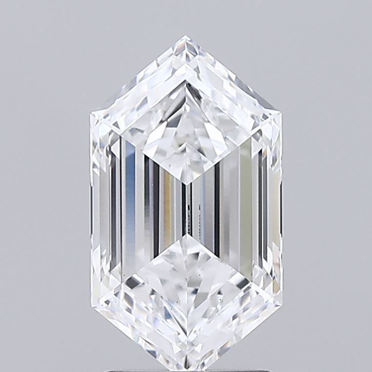 2.06 A hexagonal, clear, and reflective diamond rests against a plain gray background, showcasing its intricate facets and sharp edges with brilliance.