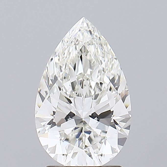2.09 A meticulously cut pear-shaped diamond glimmers under soft lighting, showcasing its intricate facets and brilliant clarity.