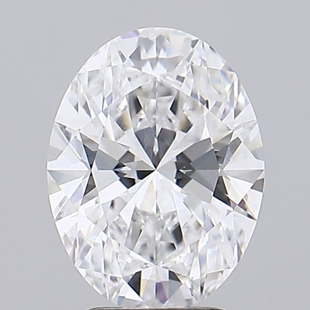 2.28 Oval-cut diamond with intricate facets reflecting light, creating a brilliant sparkle. Set against a plain gray background, conveying elegance and luxury.