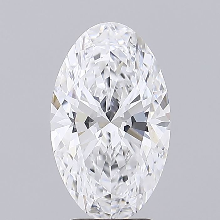 2.3 Close-up of an oval-cut diamond with brilliant clarity, showcasing its intricate facets and sparkling brilliance against a gray background.