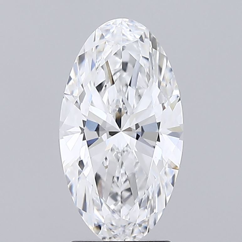 2.32 Oval-cut diamond with intricate facets, reflecting light beautifully against a plain gray background. The gem exudes elegance and luxury.