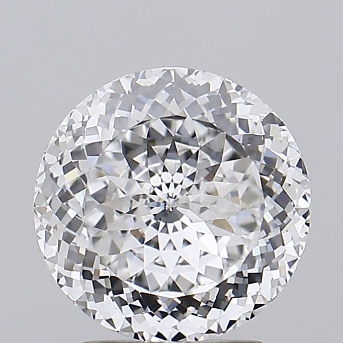 2.36 A sparkling, round brilliant-cut diamond against a gray background, showcasing its intricate facets and reflecting light, creating a dazzling effect.
