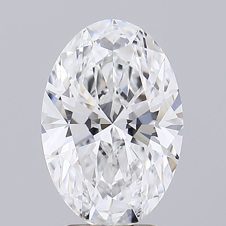 2.43 Brilliant oval diamond with numerous facets, showcasing exceptional clarity and sparkle against a subtle gray background.