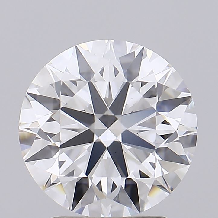 2.5 Close-up of a sparkling, round-cut diamond against a grey background, exhibiting brilliant facets and symmetry, conveying elegance and luxury.