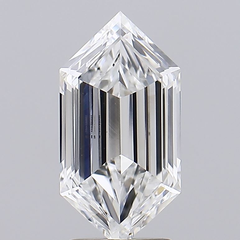 2.5 A polished, clear diamond gemstone shaped like a hexagonal prism, reflecting light with sparkling facets against a gray background.