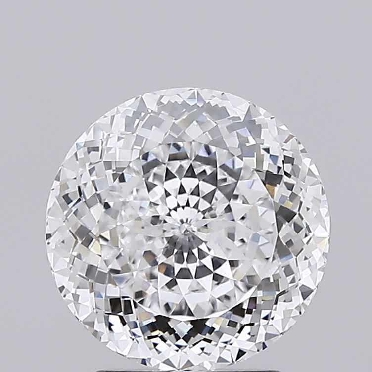 2.52 A brilliantly cut round diamond sparkles with reflective facets, showcasing its clarity and brilliance against a light gray background.