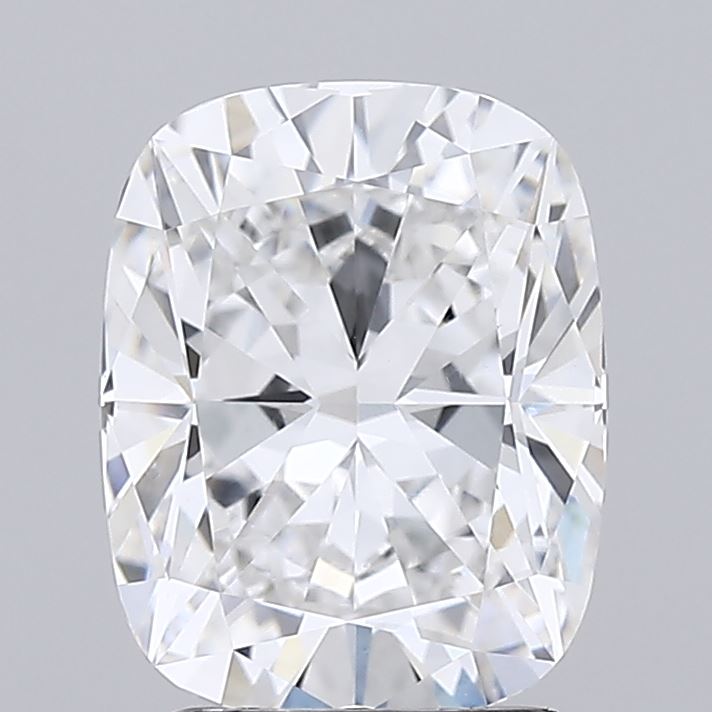 2.53 Cushion-cut diamond against a plain gray background, showcasing facets that reflect light brilliantly, conveying elegance and luxury.
