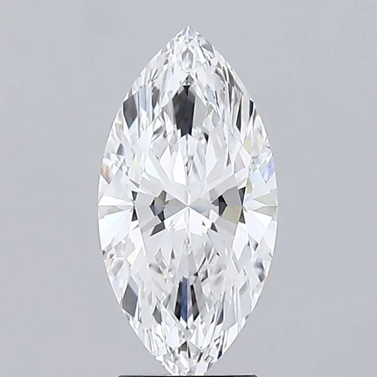 2.54 A brilliant marquise cut diamond, showcasing sparkling facets and a clear luminous appearance against a neutral background.